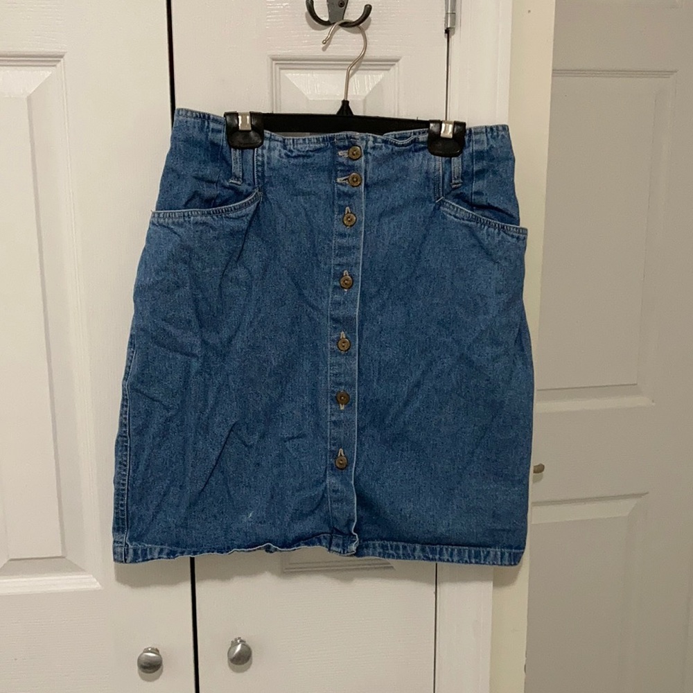 Jean skirt. Goes till above the knee